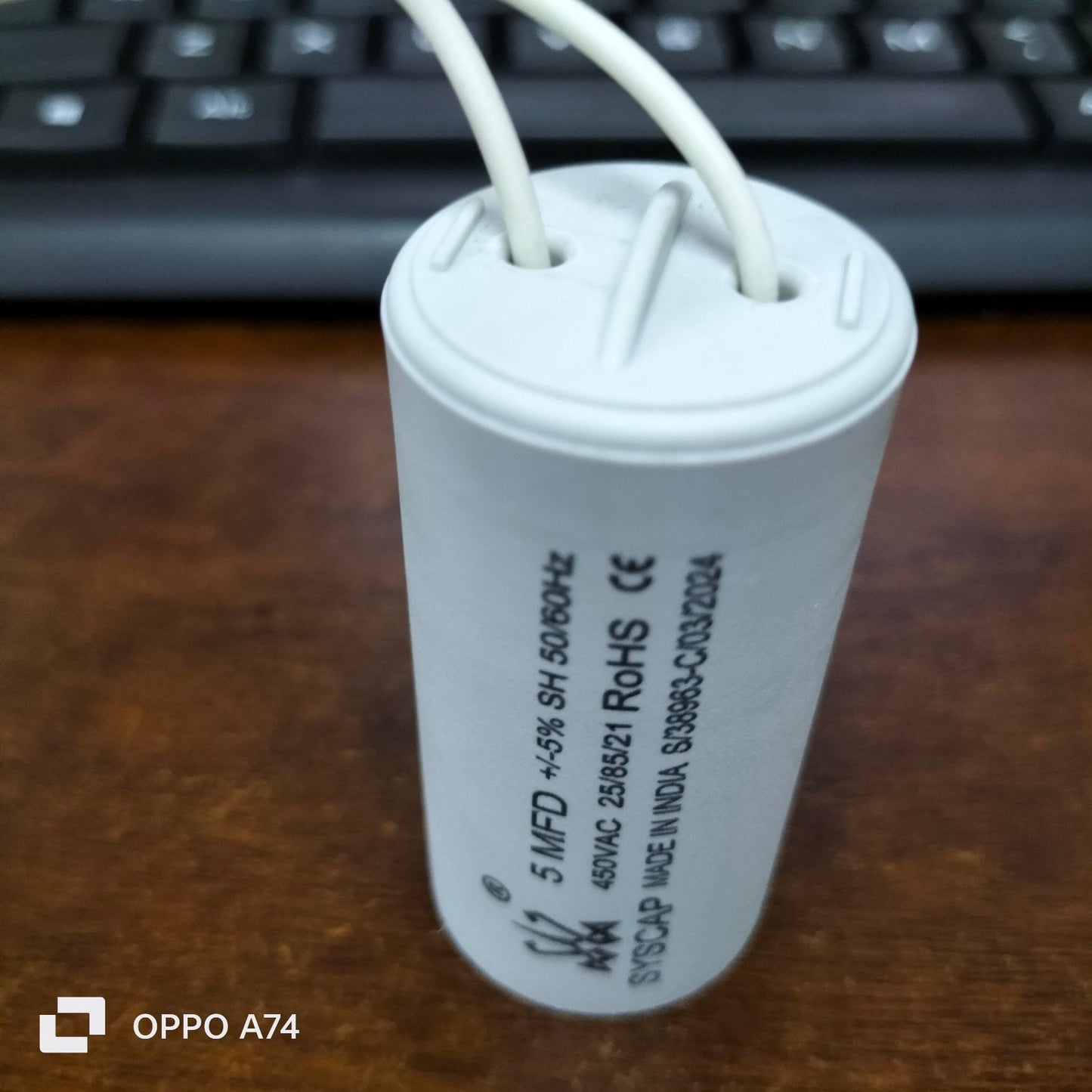 SYSCAP motor capacitor 5MFD white cylindrical electrical component with two wires from Syscap