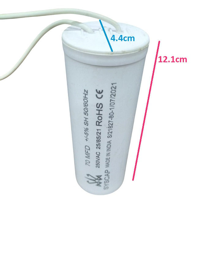 Syscap motor capacitor white cylindrical electrical part with wires and dimensions 12.1 cm by 4.4 cm