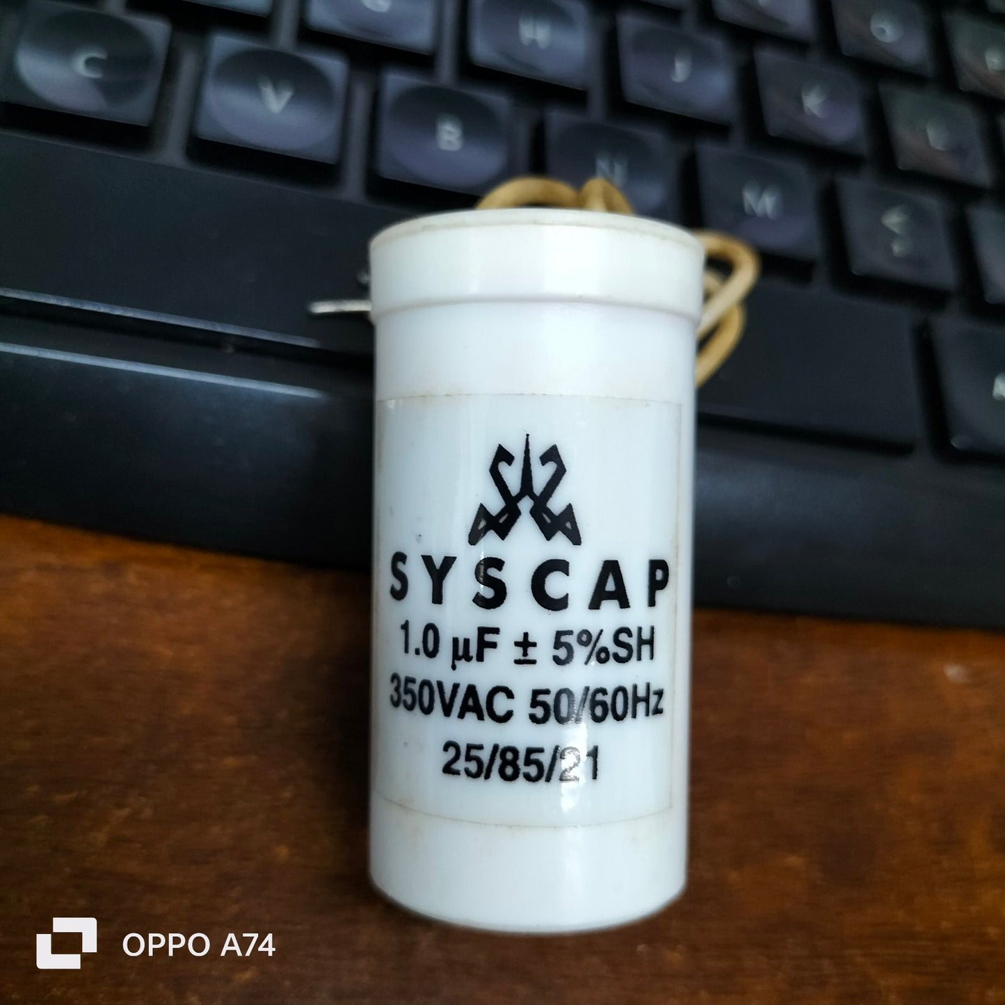 Syscap Motor Running Capacitor 1.0MFD 350VAC electrical circuitry part with voltage and frequency ratings
