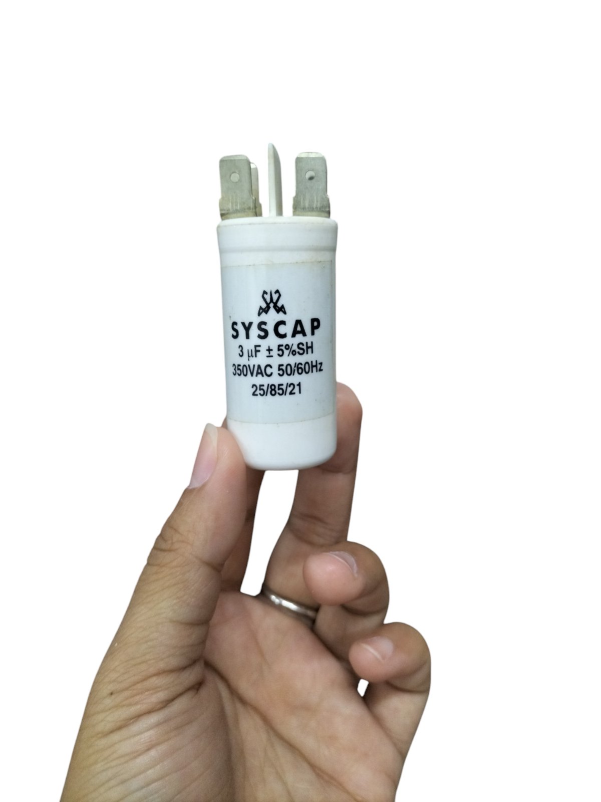 Syscap motor running capacitor 3mfd 350vac held in hand for electrical circuitry and parts