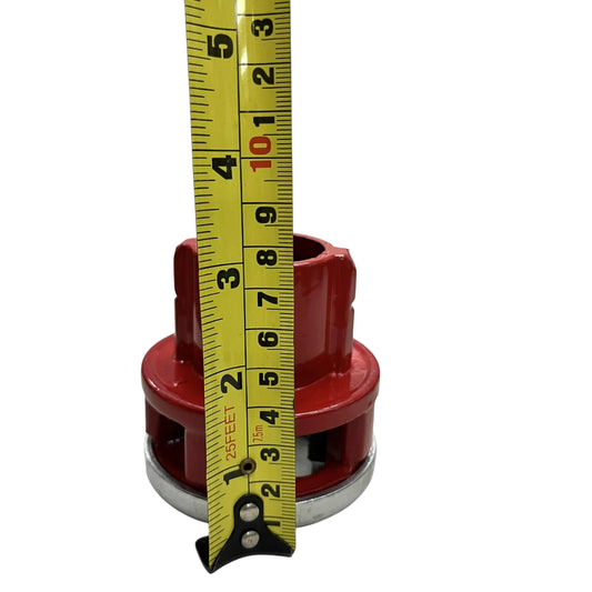 Red cast steel pipe threader head with tape measure indicating height for plumbing ratchet pipe threader set