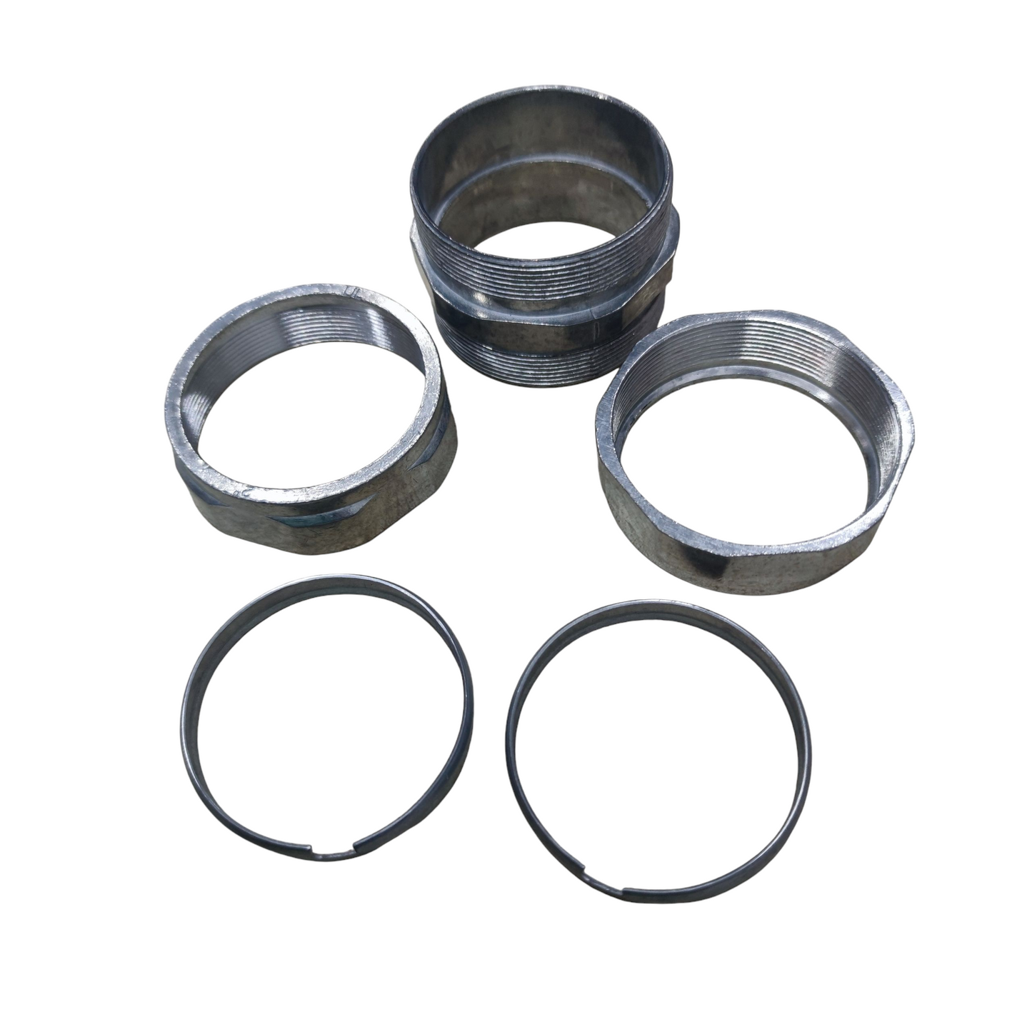 Local EMT Coupling Compression Type 50mm set showing threaded metal coupling body with two locknuts and two split rings