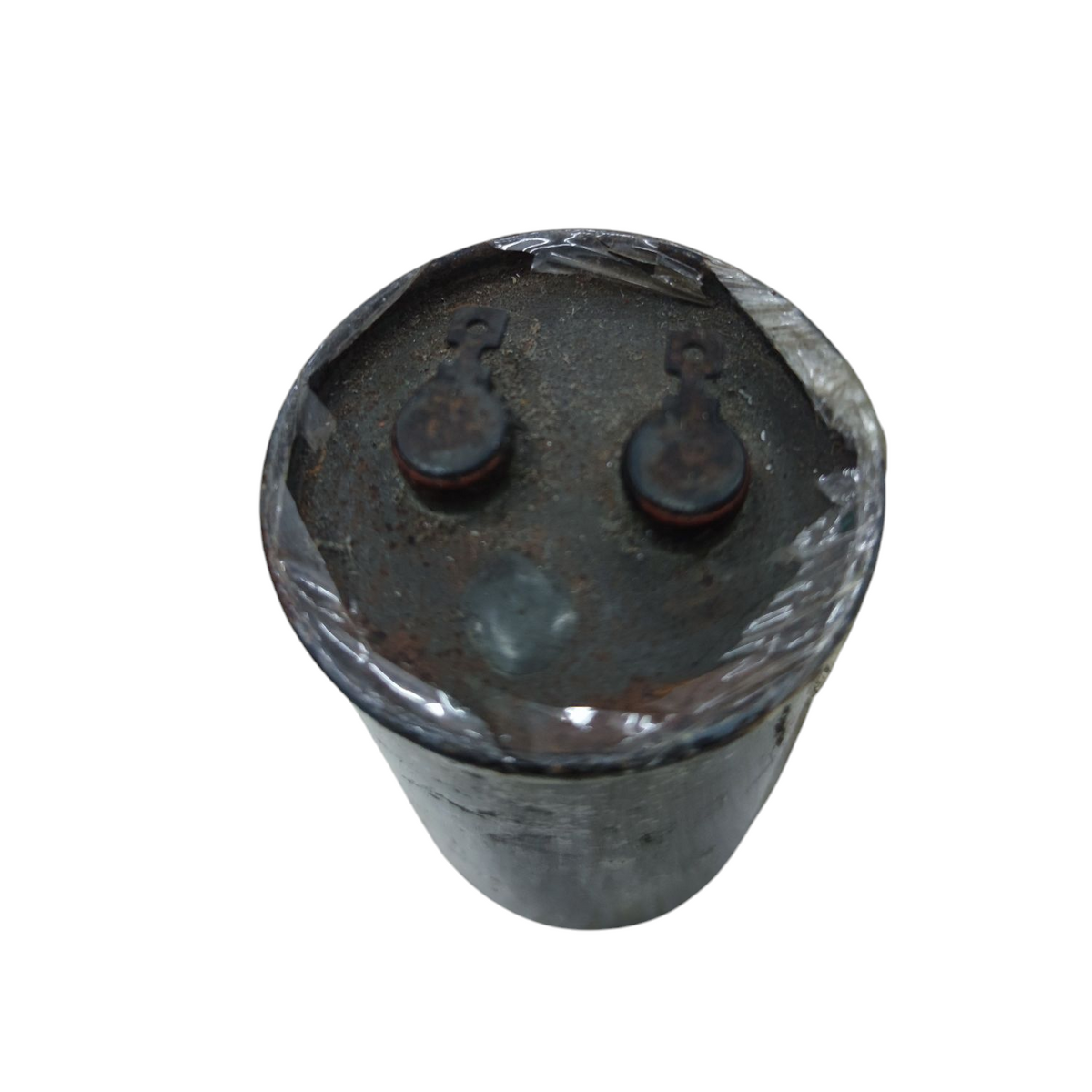 Sprague 5 uF 220V capacitor for sale with a worn exterior and two connection terminals