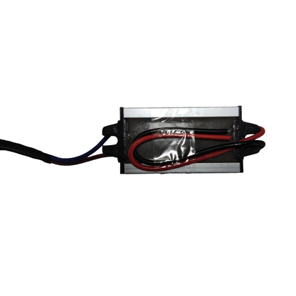 A small rectangular electronic component with a black body, silver metal ends, and attached black and red wires, shown on a plain white background.