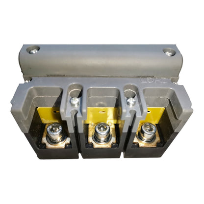 A three-terminal electrical connector or terminal block with a gray top cover, black base, and yellow insulating accents, shown on a plain white background.