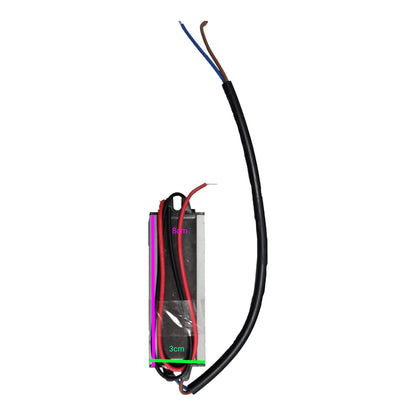 A rectangular black-wrapped electronic component with exposed red, pink, blue, and brown wires, shown on a plain white background with a green measurement overlay reading 3cm.