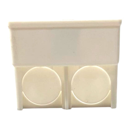 An off-white plastic double outlet cover plate or wall switch component with two circular cutouts, shown against a plain white background.