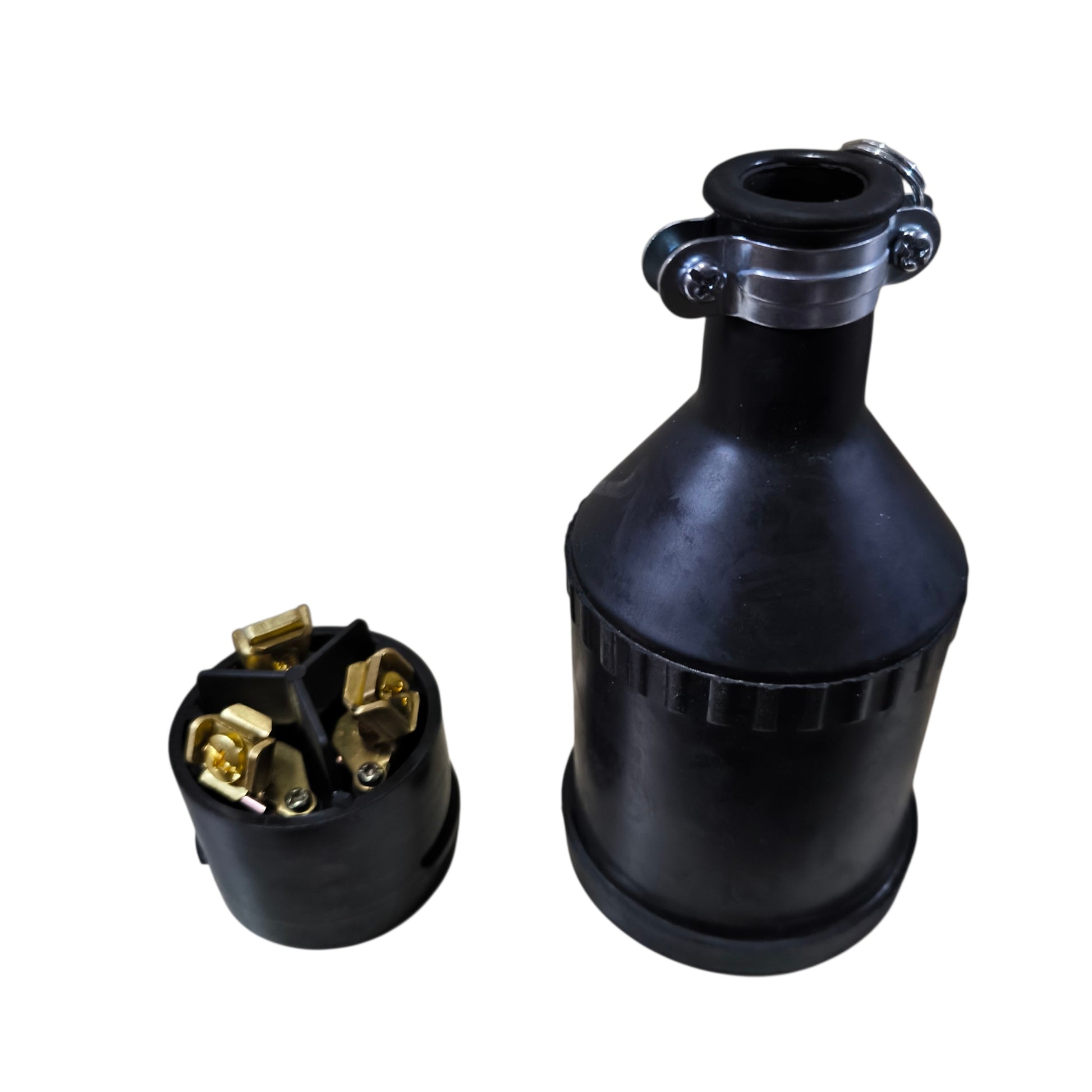Black mechanical component with gold connectors on a white background