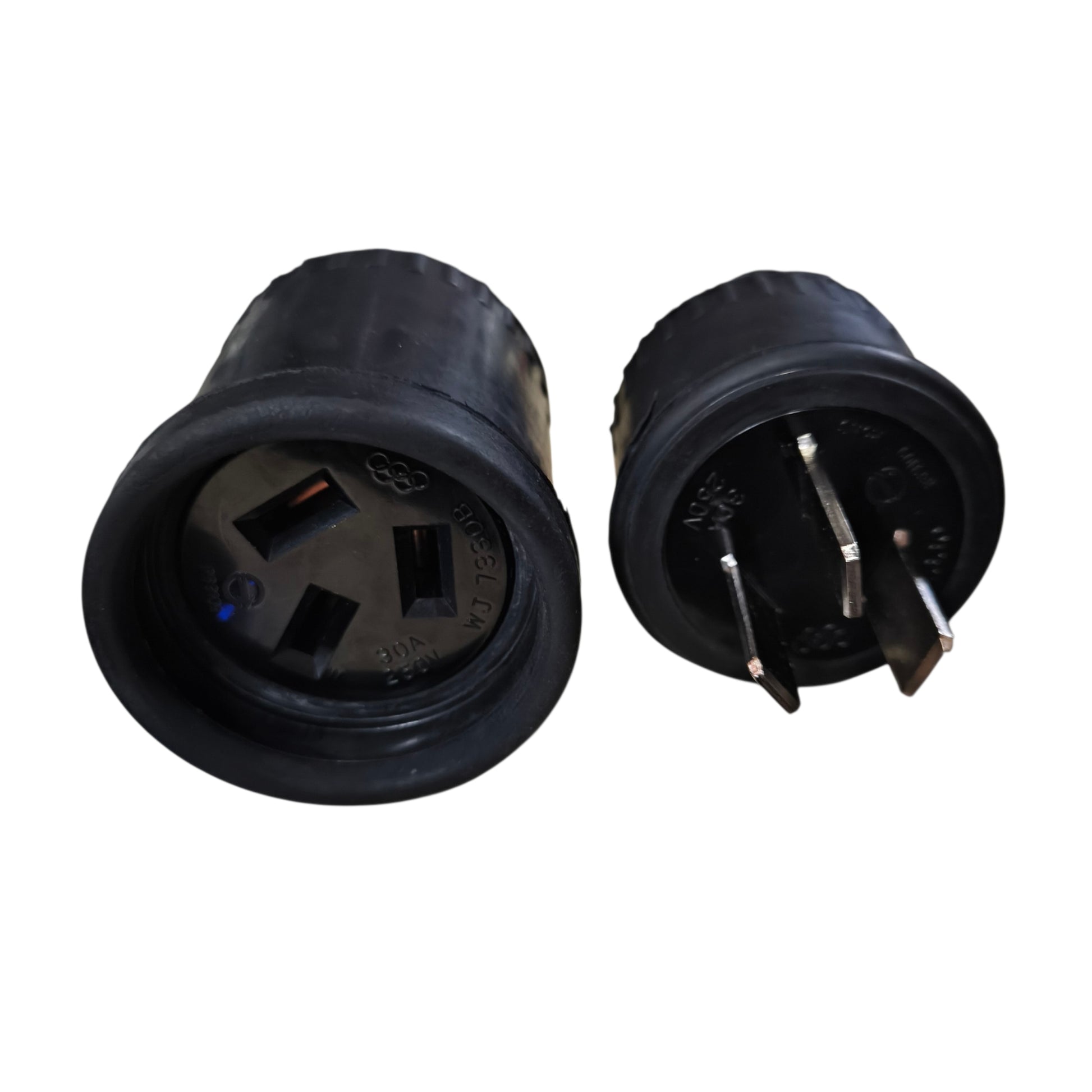 Two black electrical connectors on a white background