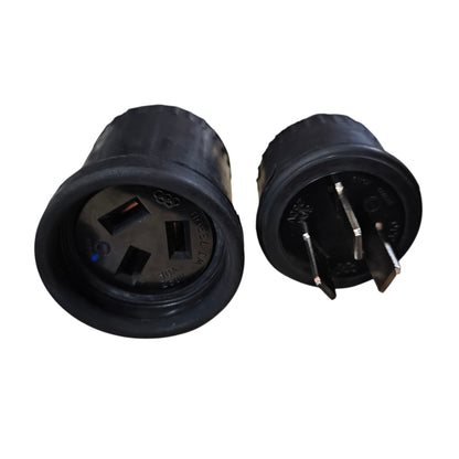Two black electrical connectors on a white background