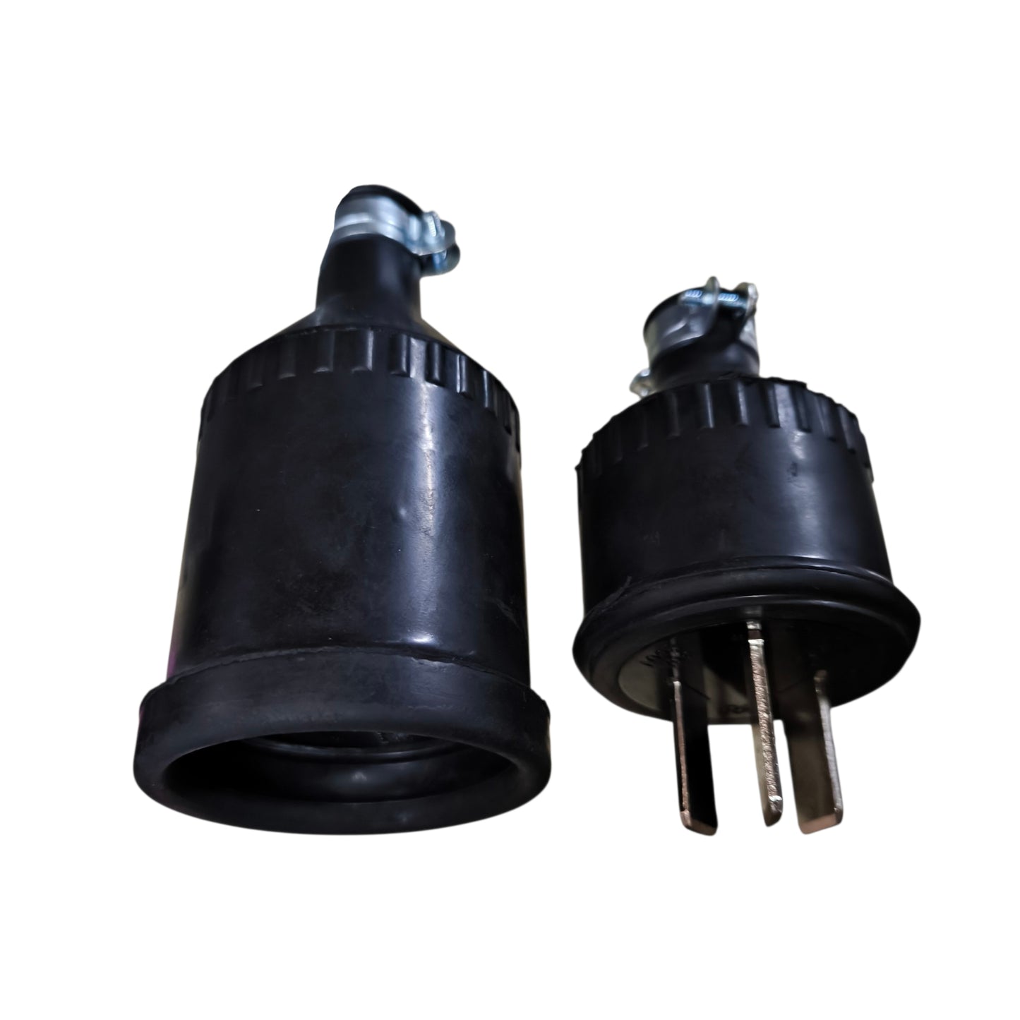 Two black rubber components on a white background