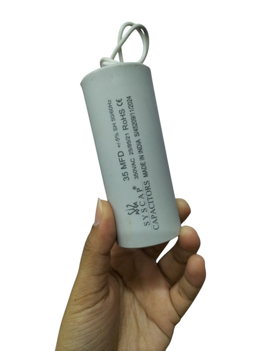 Syscap 35MFD 350 VAC Running Capacitor held in hand for electrical circuitry use