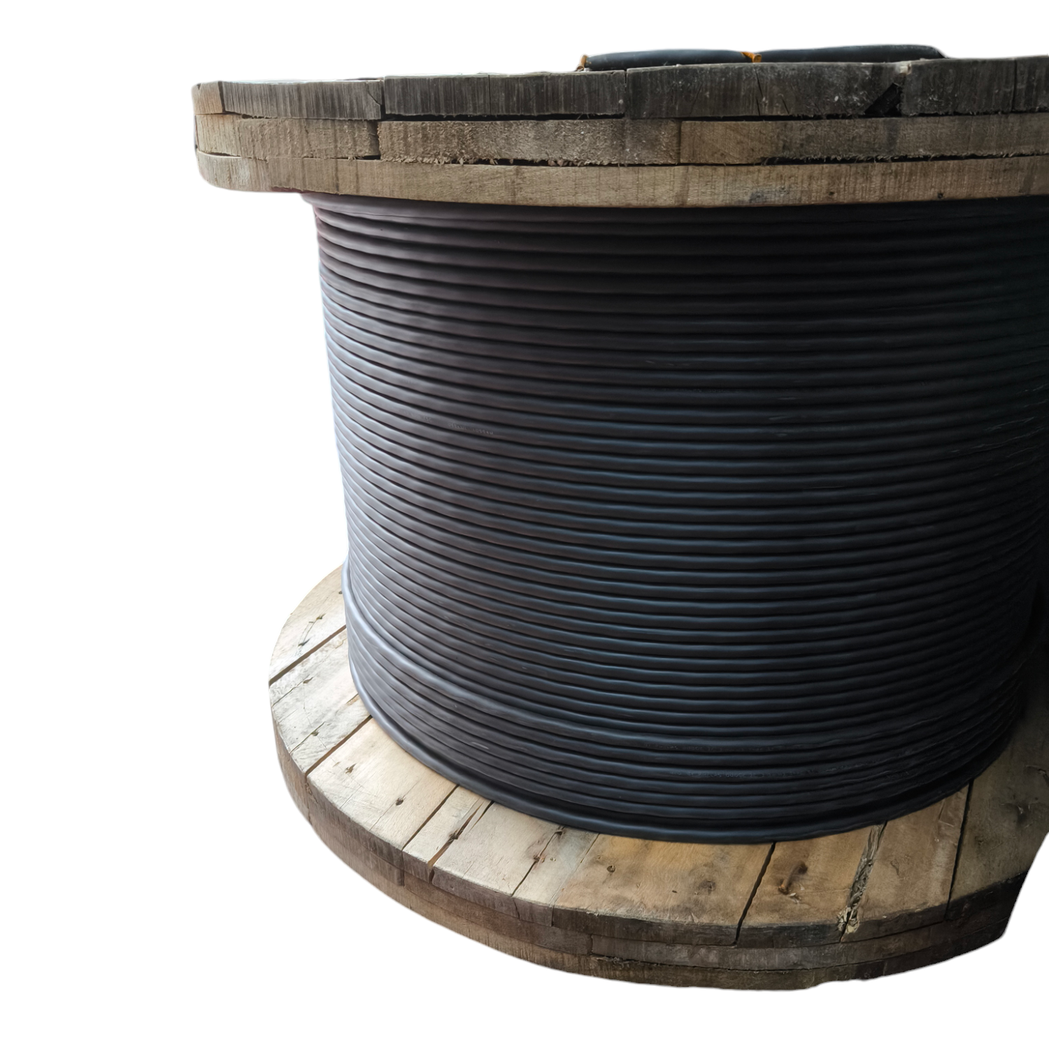Philflex 4 core 38mm electrical cable neatly coiled on large wooden spool for industrial use