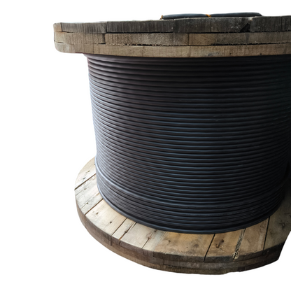Philflex 4 core 38mm electrical cable neatly coiled on large wooden spool for industrial use