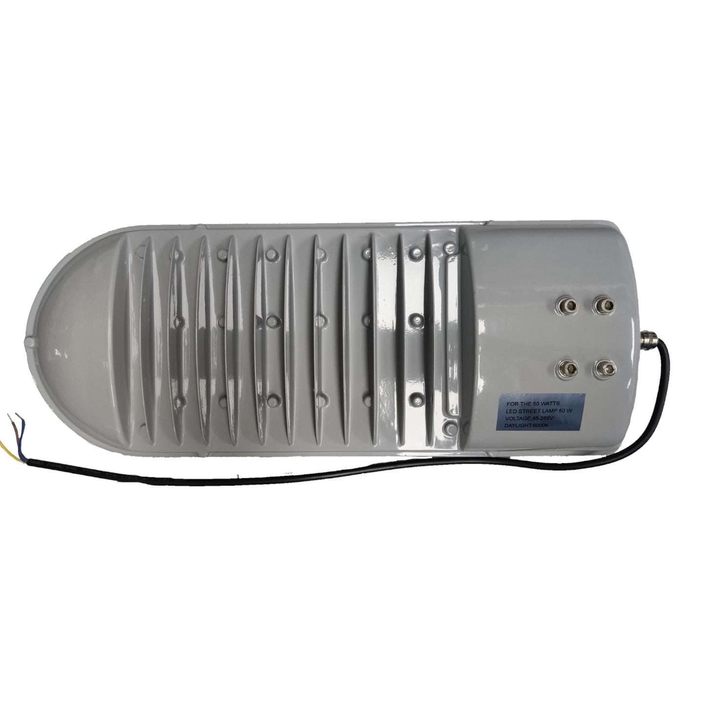 Gray industrial device with ribbed surface and visible wiring on a white background
