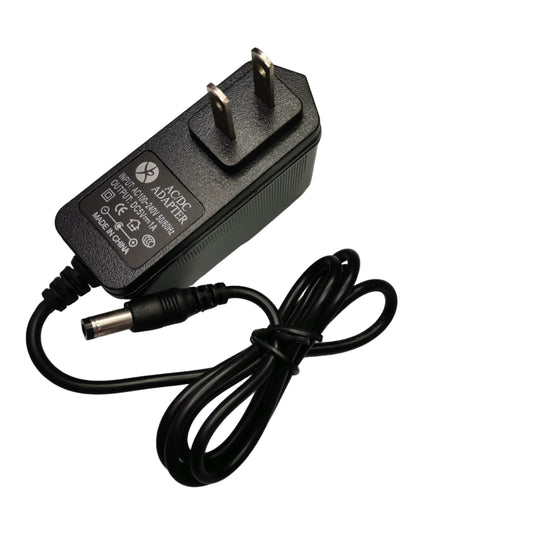 Grippes 5V 1A AC DC power adapter with a two-prong plug and a black power cord