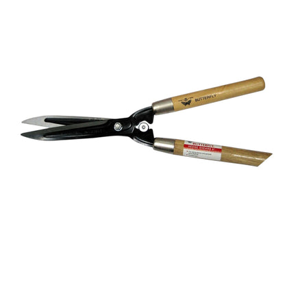 A pair of butterfly shears with black metal blades and light brown wooden handles, shown on a plain white background.