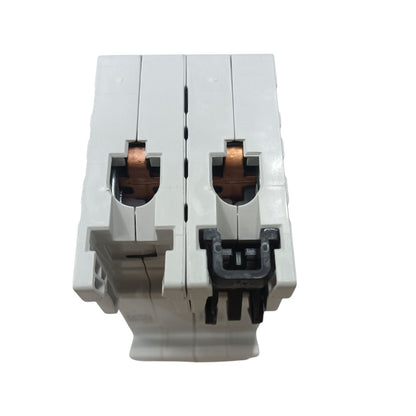 A white double-pole circuit breaker with copper-colored internal terminals and a black plastic latch mechanism, shown against a plain white background.