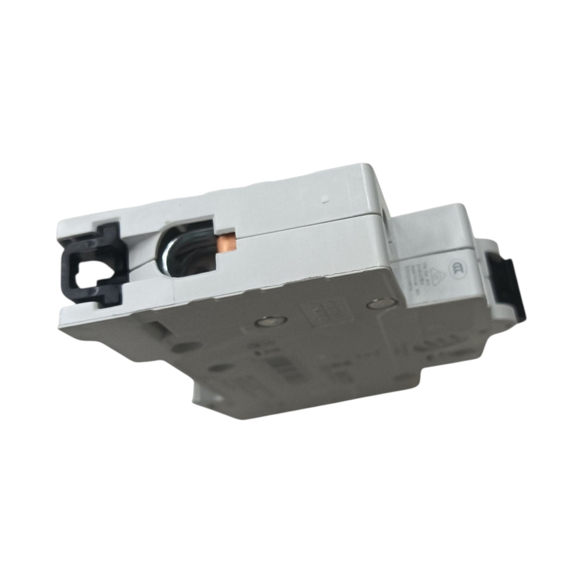 A gray electrical component or module with black connector parts and a small copper-colored terminal, shown on a plain white background.