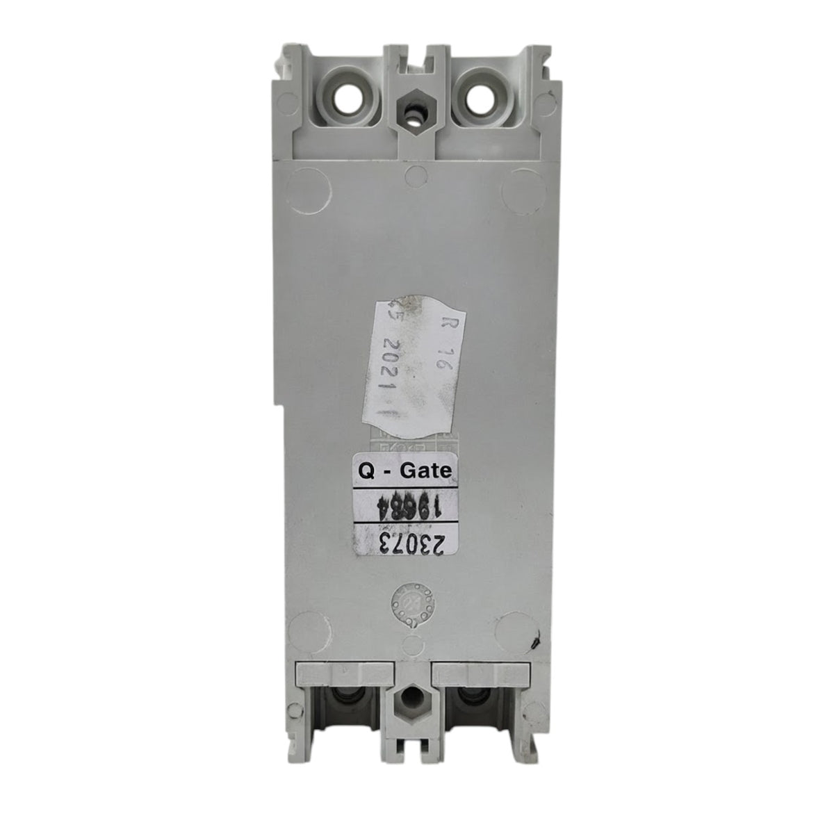 A gray plastic electrical contactor or relay component with terminal holes at the top and bottom, featuring a white paper label that reads 'Q - Gate' and numbers '23073'.