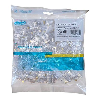 A clear plastic bag filled with CAT 6E RJ45 jack networking cable connectors, branded Amp Electronics and Tyco Electronics, on a white background.
