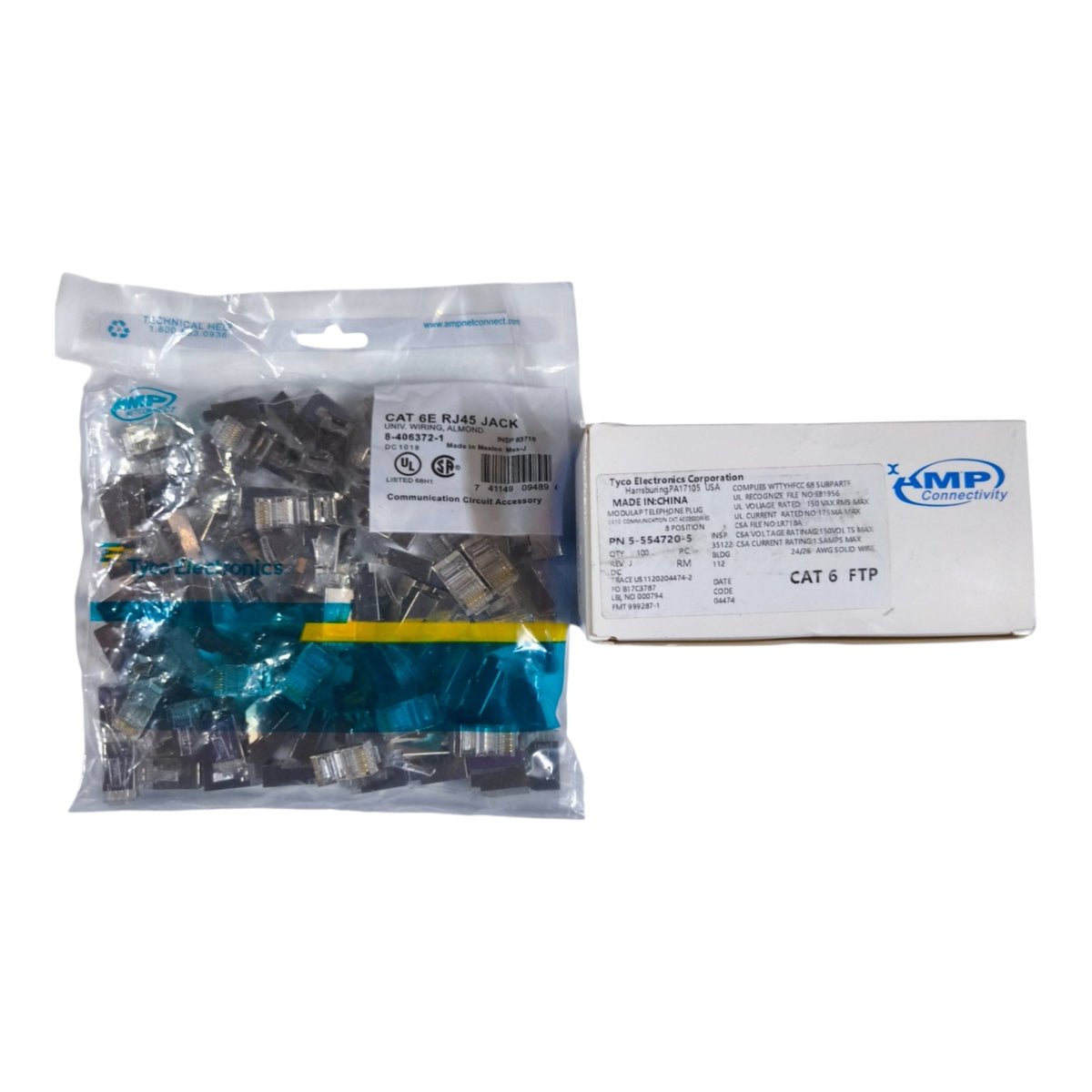 A clear plastic bag containing multiple small dark metal connector components with translucent blue protective covers, shown next to a white product box labeled MP and CAT 6 FTP.