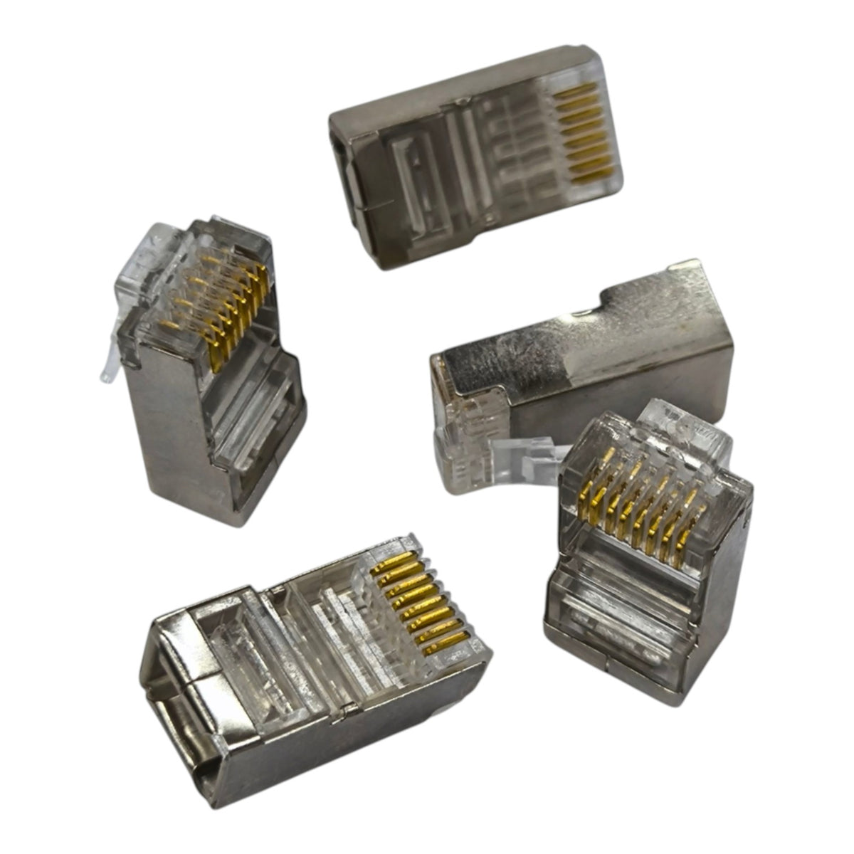 Five RJ45 Ethernet network module connectors with gold-plated pins, shown from various angles on a plain white background.