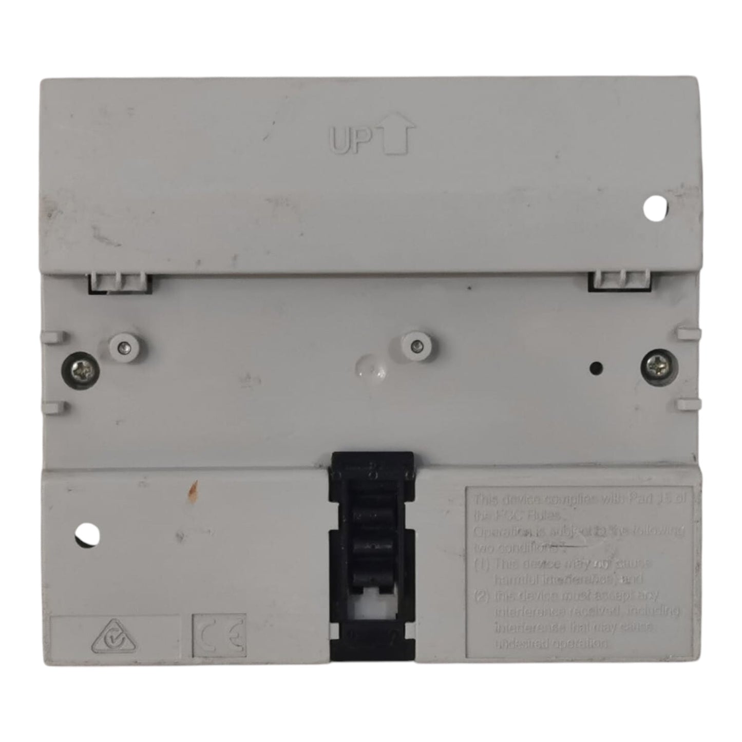 A light gray plastic electrical component or terminal block with a black central connector cover, photographed against a plain white background.