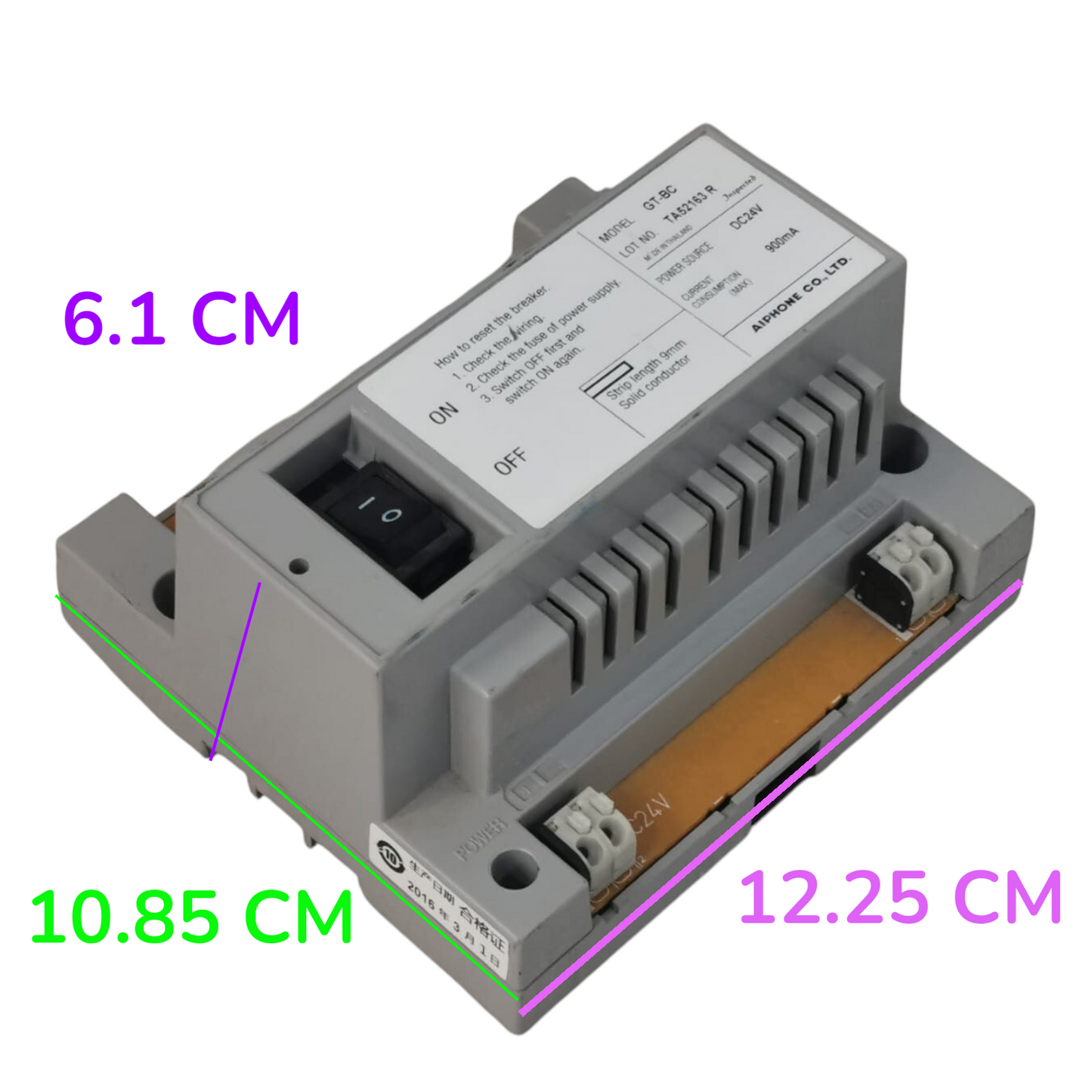 A gray electrical module with a black switch and terminal connectors, shown with overlaid purple and green dimension labels reading 6.1 CM, 10.