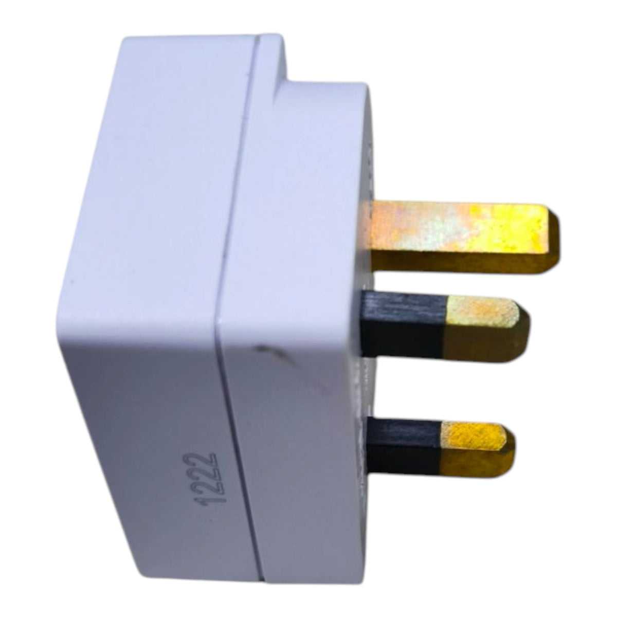 A white UK three-pin wall plug adapter with gold-toned metal prongs, shown on a plain white background.