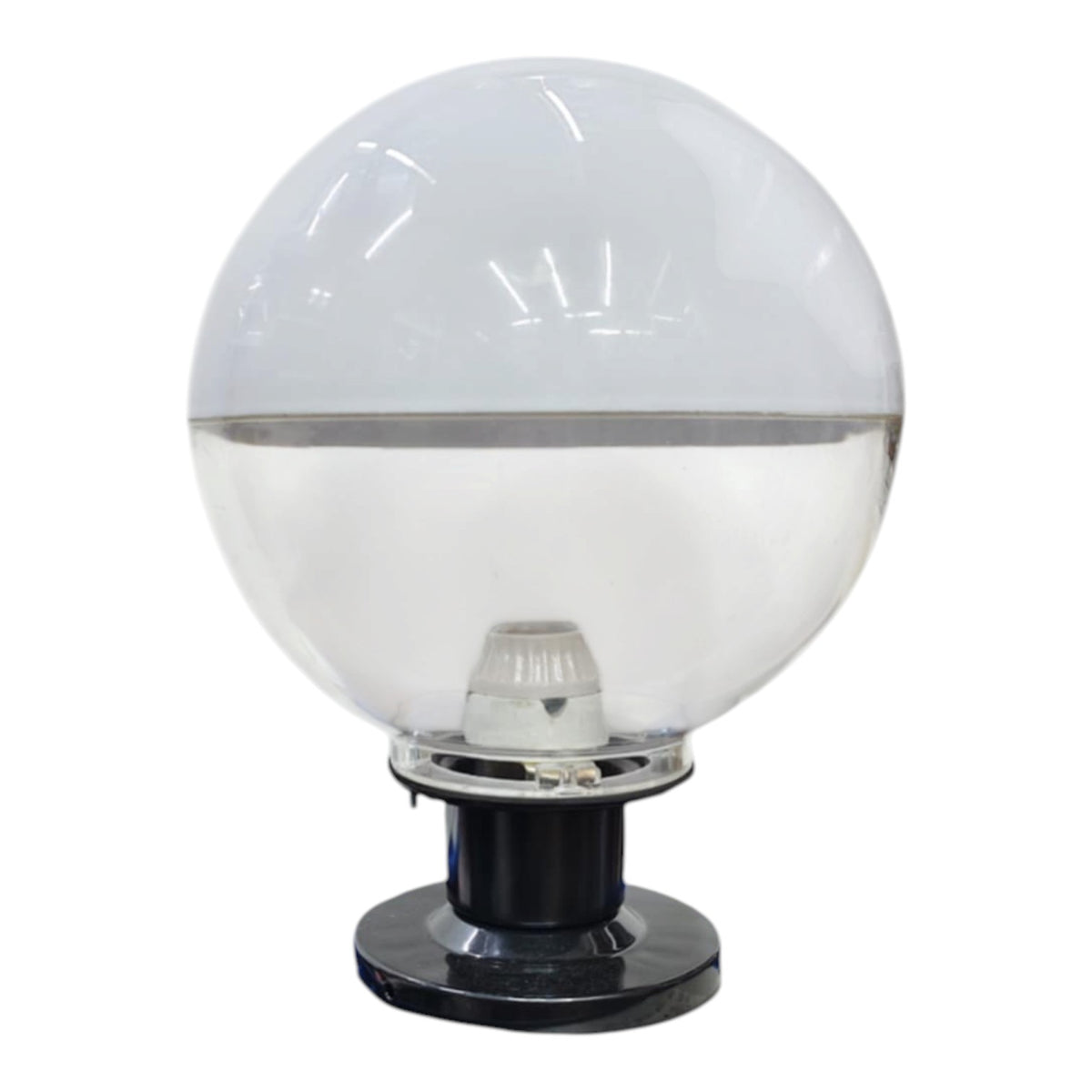 A modern globe street light featuring a clear glass sphere with a horizontal silver band, mounted on a black metal base.