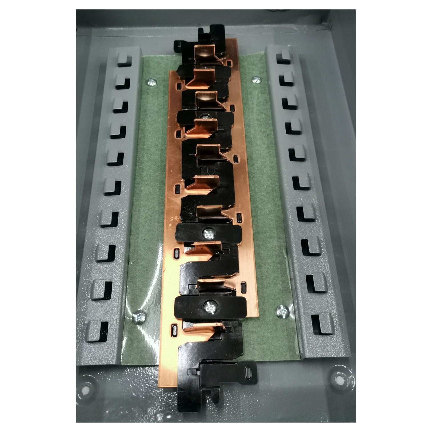 Electronic component with copper and black metal parts on a green and gray background America 7X7 Panel Boar 14 Holes Distribution Panel For 2 Pole Plug In Circuit Breaker 12 Branches Side Main Electx Electrical Supply