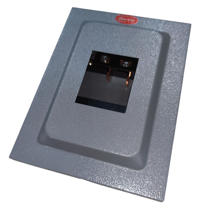 Nema 1 panel board for GE TQL breakers. America gray metal panel with cutout showing copper lugs