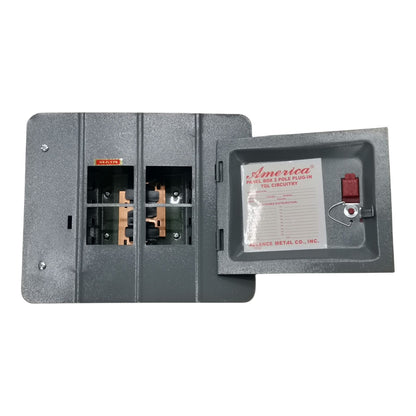 A gray metal electrical breaker box with the door open, showing internal components on the left and a lockbox with a key on the right. A paper insert inside the lockbox reads 'America' and '2-Pole Fuse In Tie-Security'.