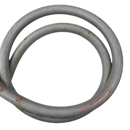 A coiled gray corrugated metal pipe or tubing with some rust stains, isolated on a white background.