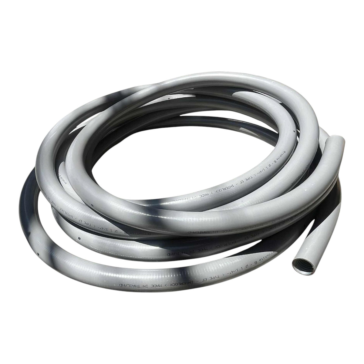 A coiled gray flexible corrugated hose with printed technical specifications, shown on a solid white background.