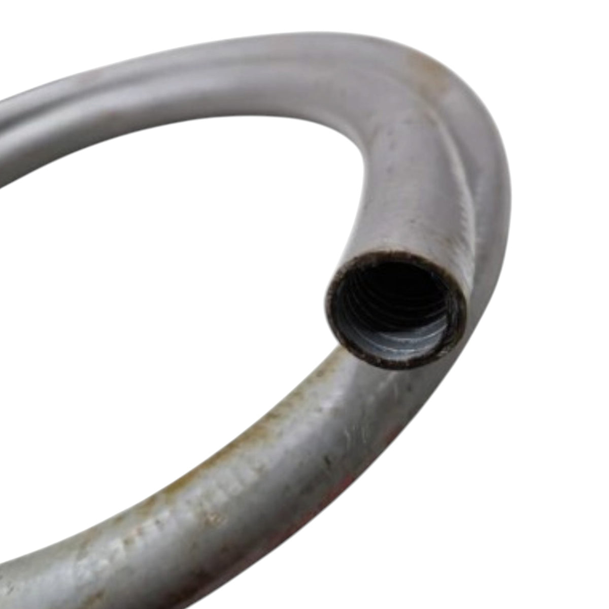 A close-up of a curved metal pipe or hose with a threaded end, showing a weathered silver-gray surface with some rust or discoloration, isolated on a white background.