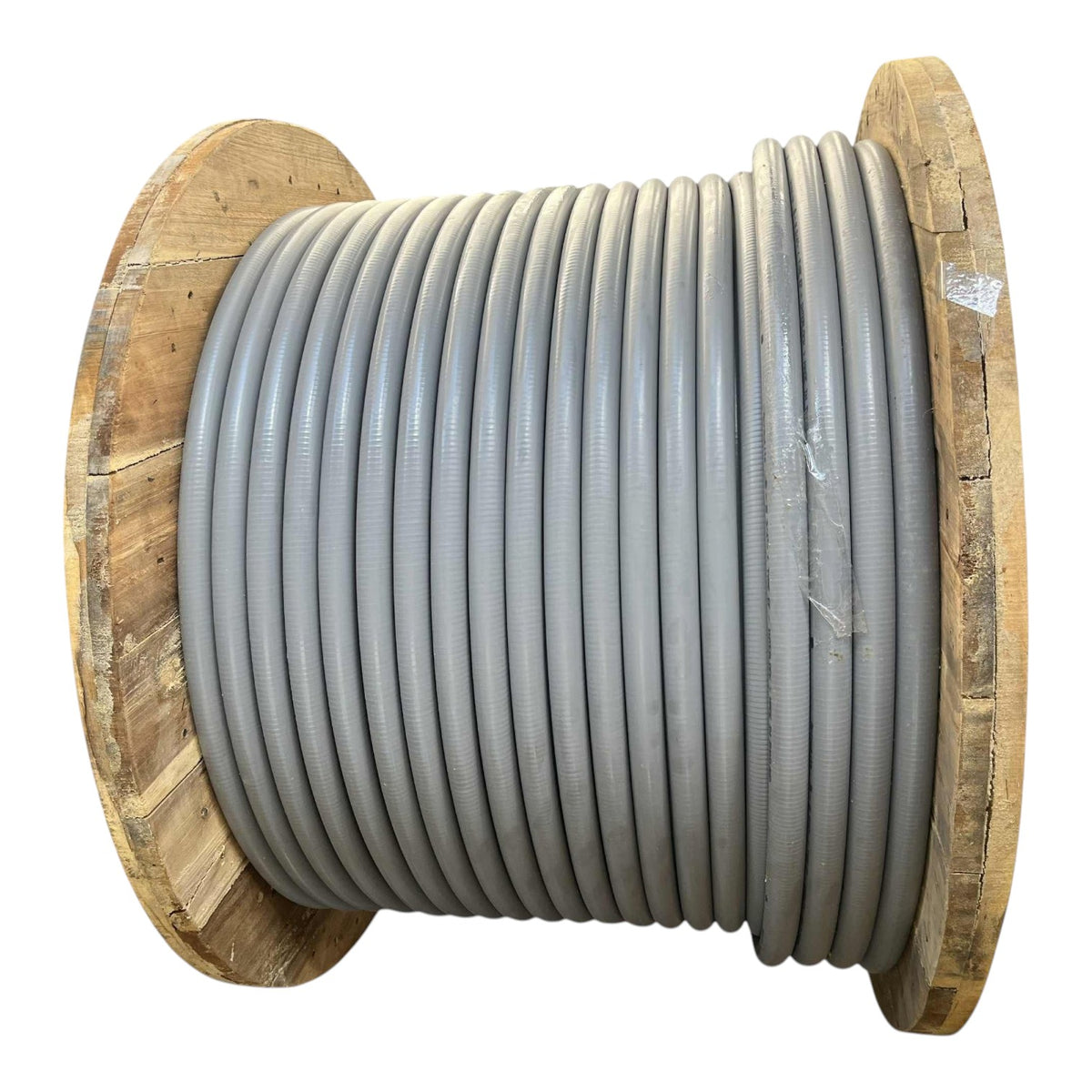 A large spool of thick gray cable or conduit wrapped around wooden spool flanges, shown on a plain white background.