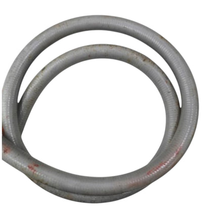 A coiled gray corrugated plastic or metal pipe section with some red paint markings, isolated on a white background.