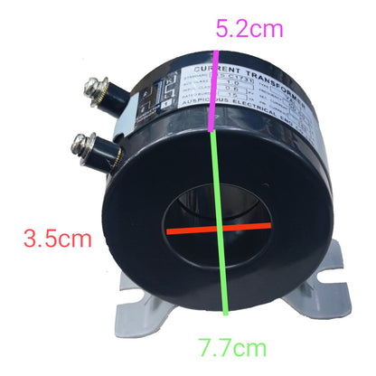 A black cylindrical current transformer with metal mounting feet and two screw terminals, shown on a white background with overlaid dimension lines and text indicating 5.2cm, 3.