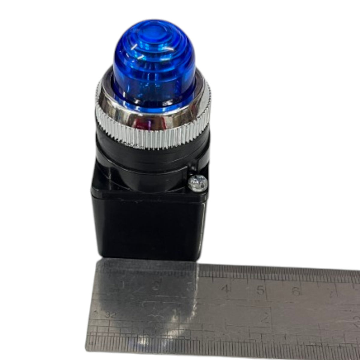 A small blue warning light or alarm switch with a black base and silver metal collar, shown next to a metal ruler on a white background.