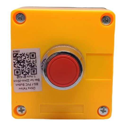 A yellow plastic emergency stop button box with a central red push-button and a silver metal bezel, shown on a plain white background.