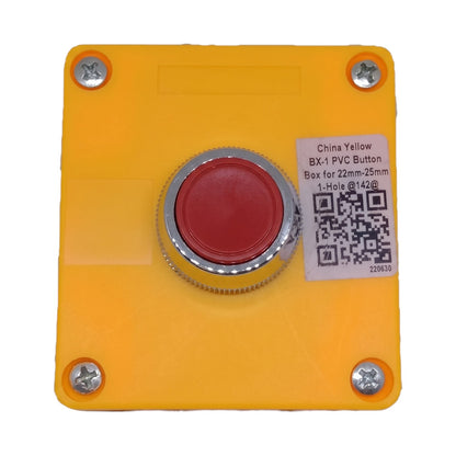 A square yellow industrial emergency stop button with a red center and a silver metal bezel, mounted on a yellow plastic plate with four corner screws. A white sticker on the right side shows product details and a QR code.