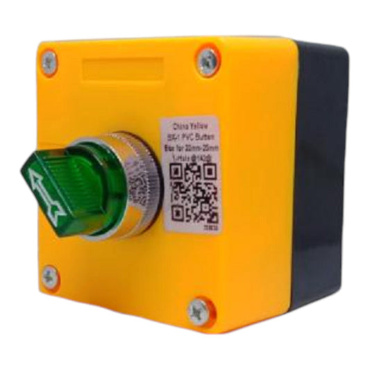 A square industrial push-button module with a bright yellow faceplate, a green translucent button, and a black side housing, shown on a plain white background.