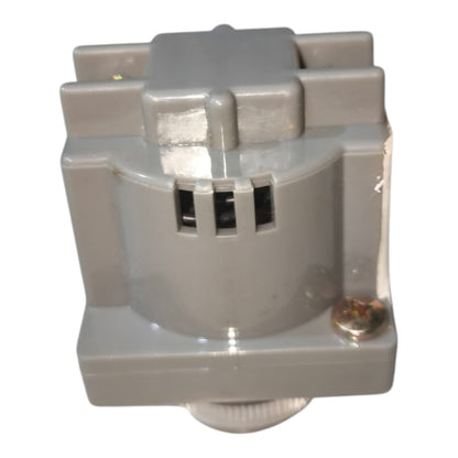 A gray plastic electrical component or sensor module with a ribbed cylindrical base, ventilation slots, and a small screw fastener, shown on a plain white background.