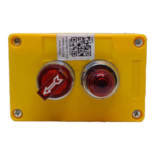 A yellow emergency stop push button enclosure with a red directional rocker switch and a second red push button, secured with four silver screws on a white background.