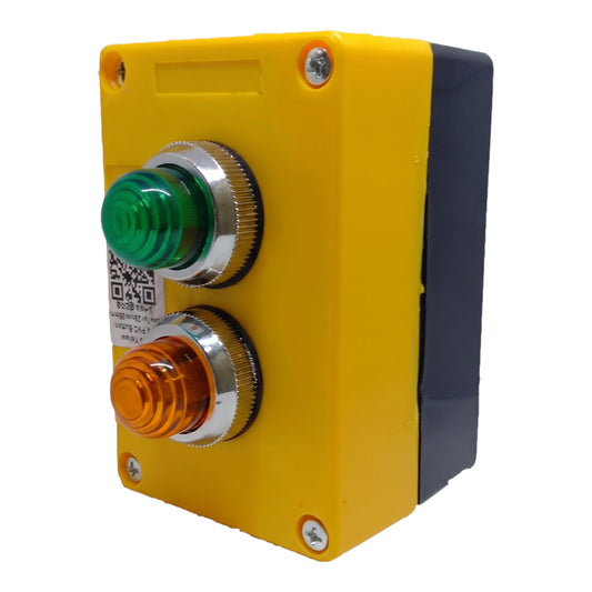 Industrial push button panel with a yellow housing, featuring a green emergency stop button on top and an orange start button below, both with silver metal bezels, set against a plain white background.