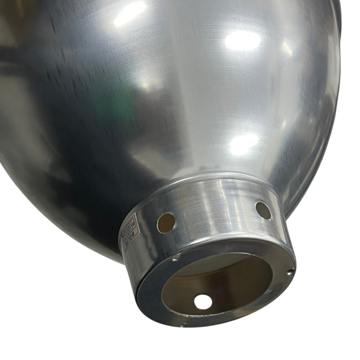 Close-up of a brushed stainless steel dome-shaped component with a circular metal flange and two circular cutouts, shown on a white background.