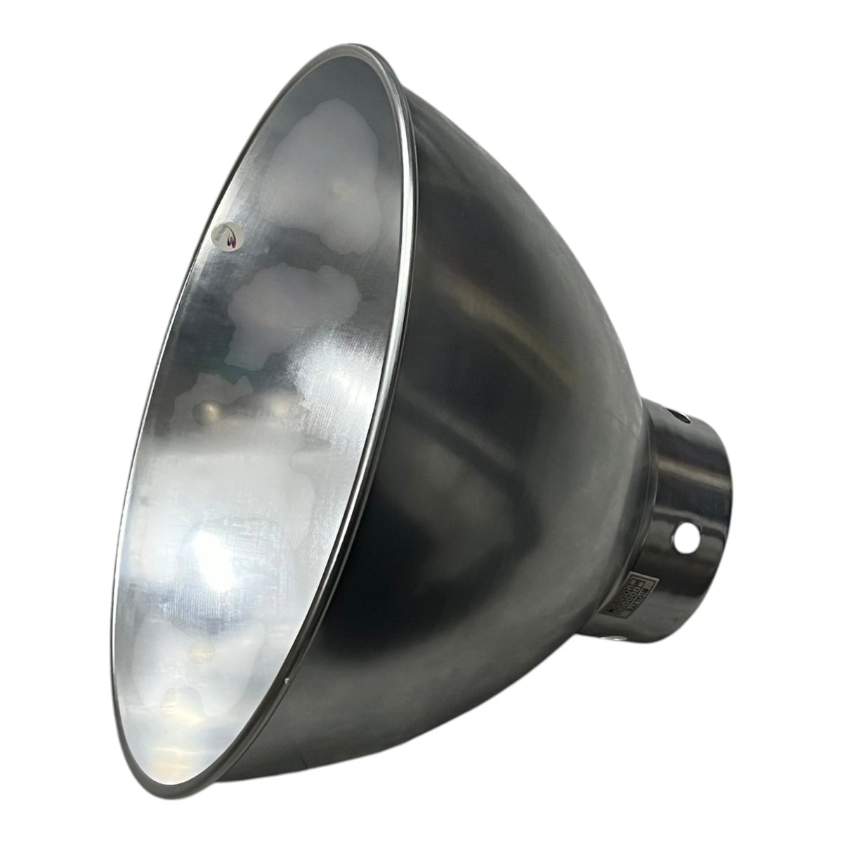 A large industrial dome reflector lamp housing, made of dark gray metal with a polished silver interior, shown on a plain white background.