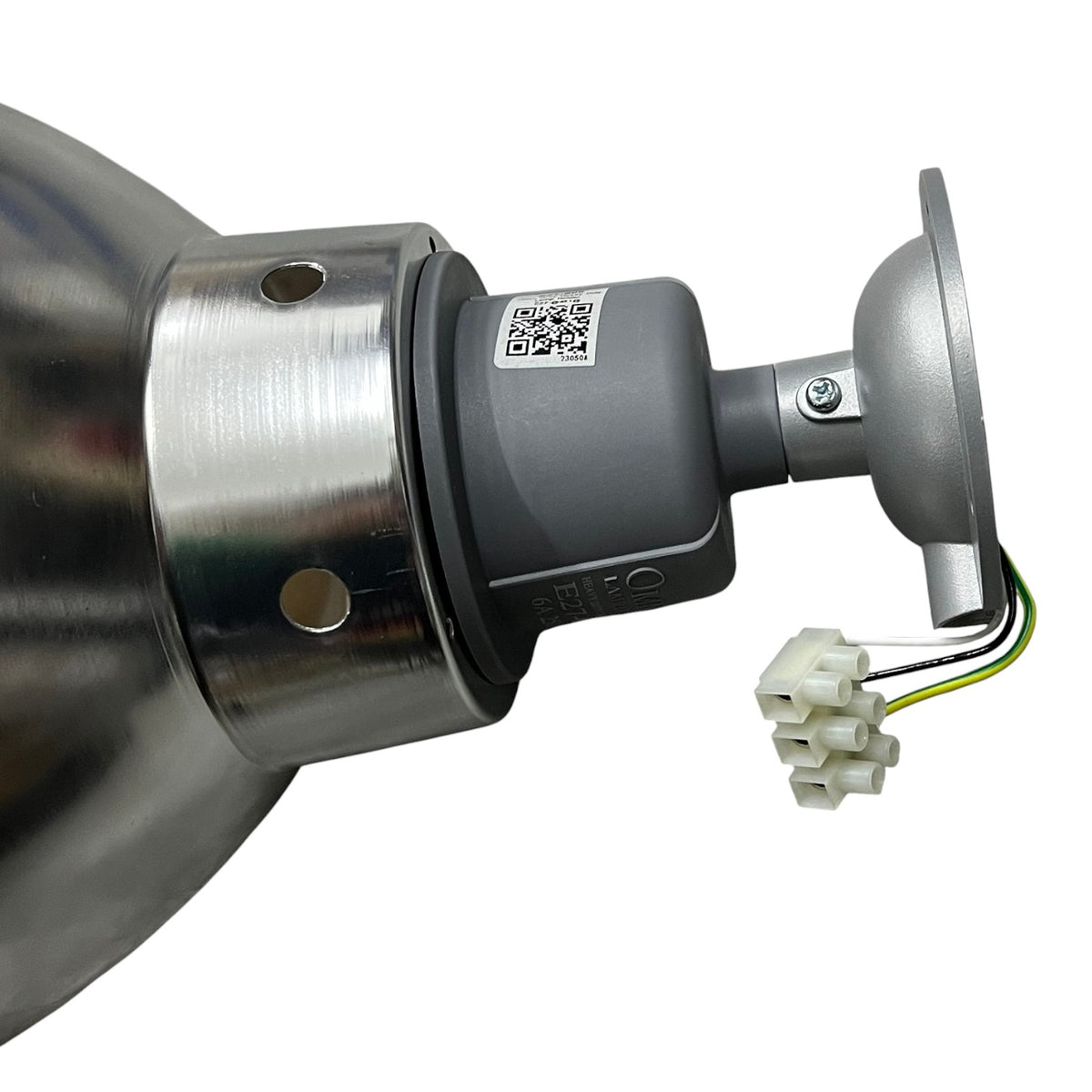 A close-up of a metal and gray electrical component with a small white connector and wire leads, shown on a plain white background.